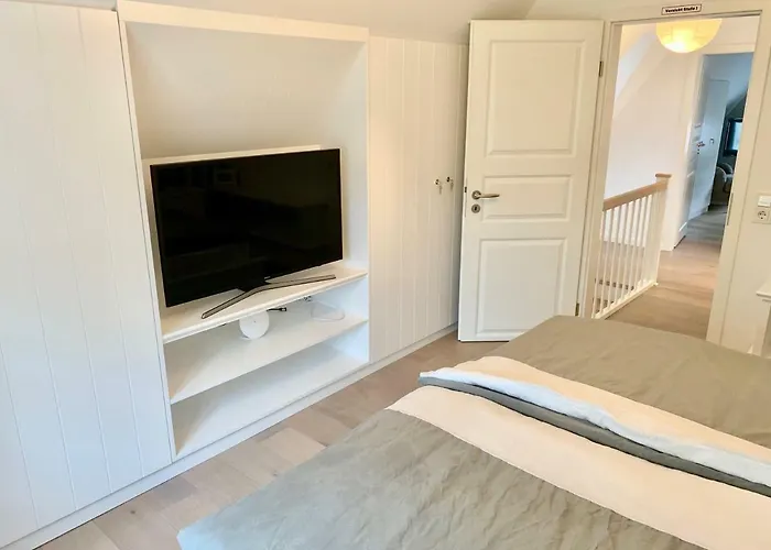 Casa de Férias Eidumhaus, Freistehendes Reetdachhaus Mit Garten In Strandnaehe